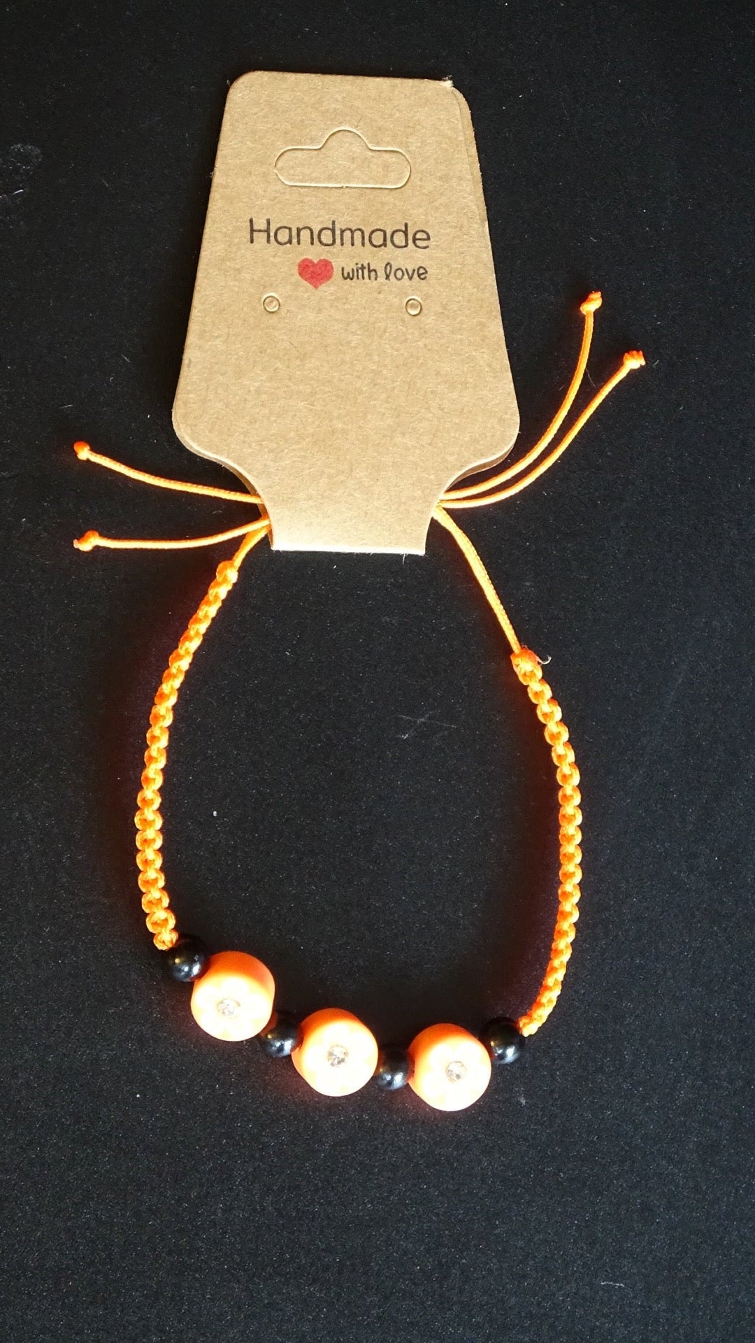 Orange & Black flower bracelet