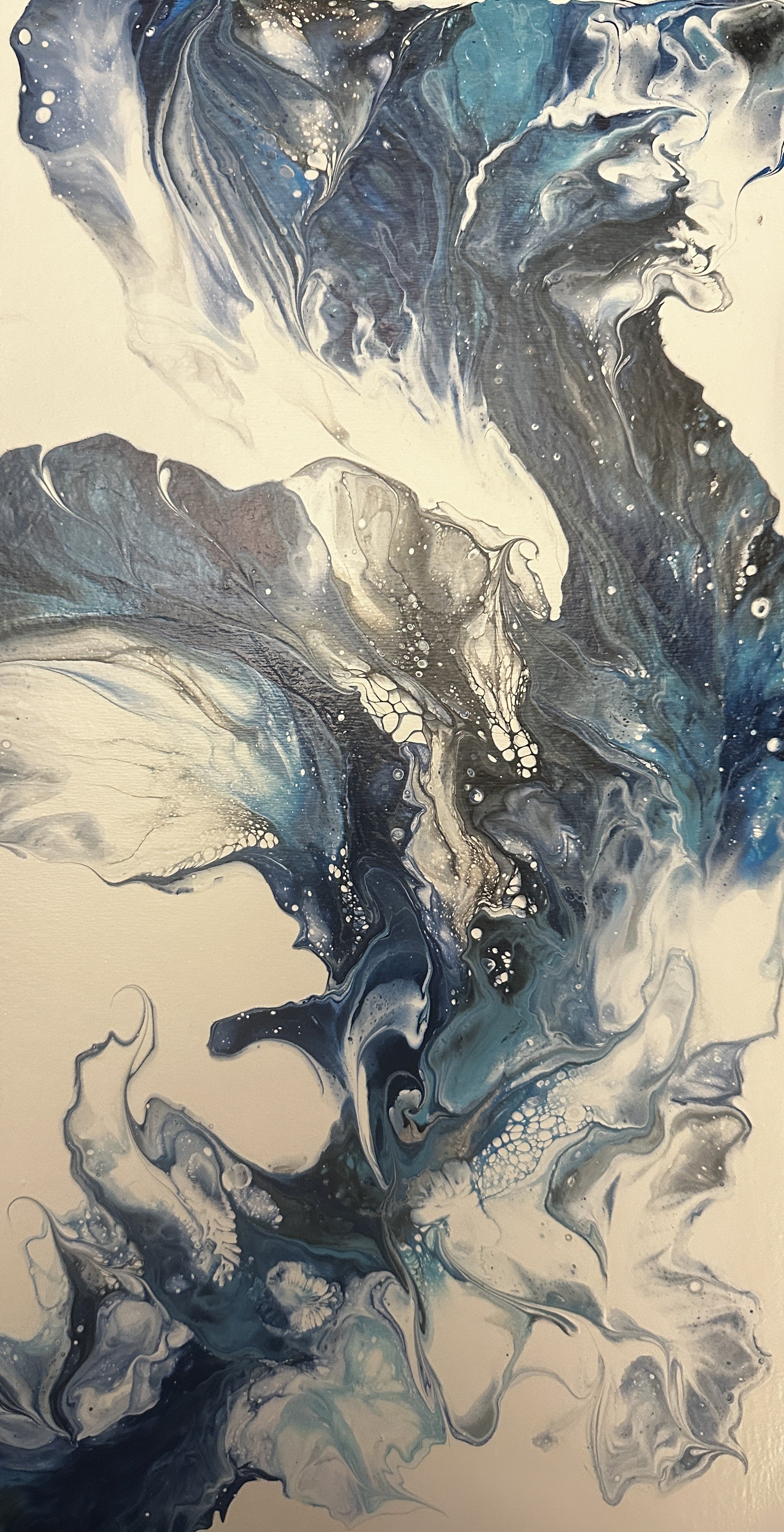 Blue on white acrylic pour