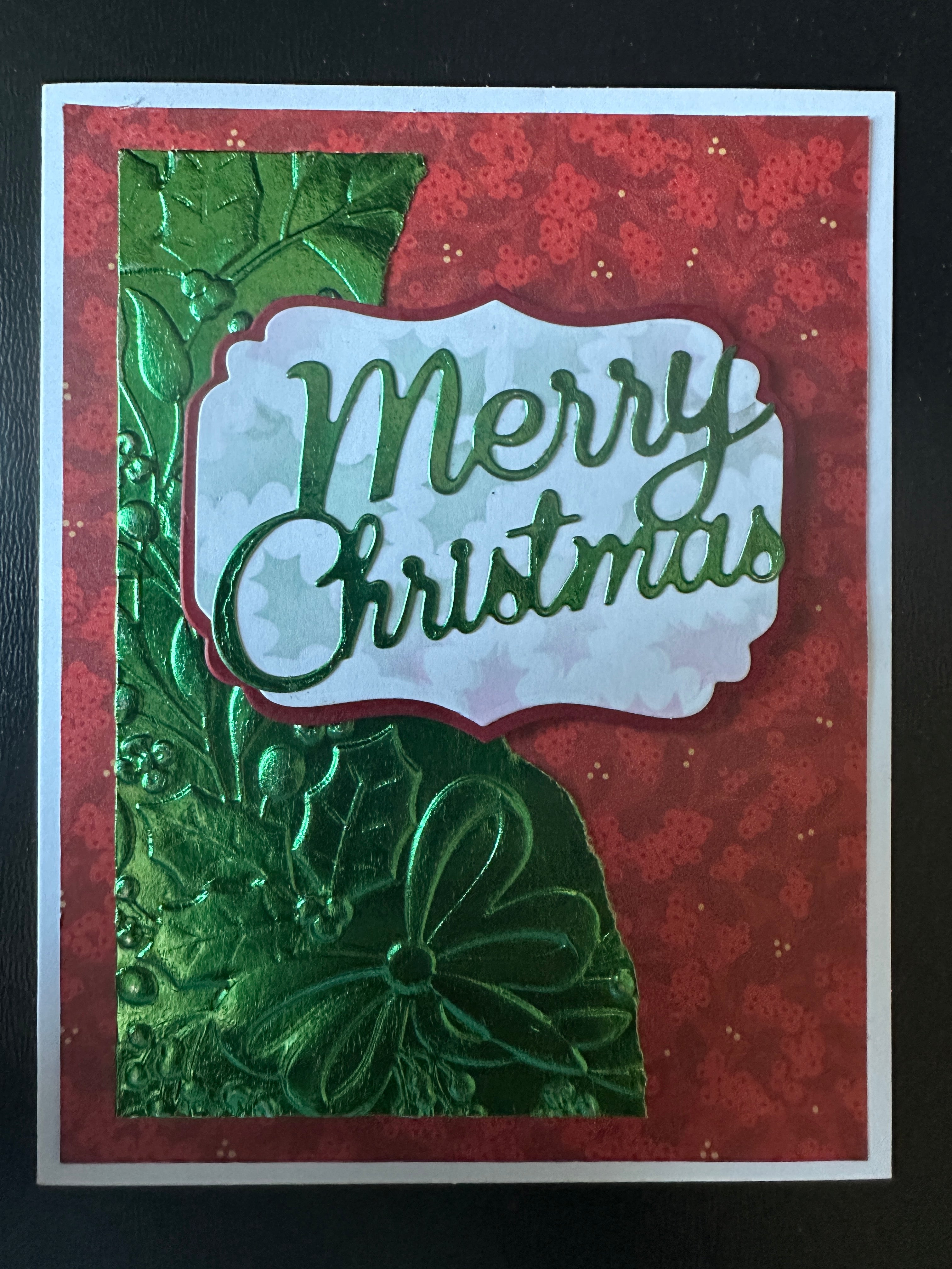 Merry Christmas green embossed swoosh
